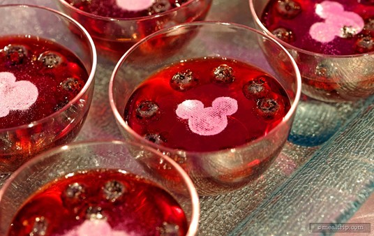 These Mickey foiled Acai Berry Fruited Jell-O Cups with Blueberries were at the "1964 and Beyond - Spoonful of Sugar Dessert Station".