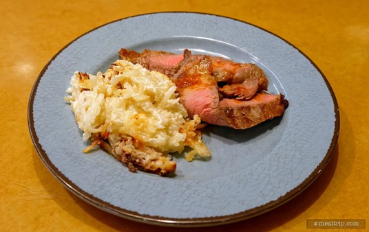 Remember, if you'd like more of anything at the Garden Grill, just ask for seconds. It's all you care to eat! Pictured here are the Cheesy Potato Casserole 
(left) and Grilled Flank Steak with Ranchero Sauce (right).