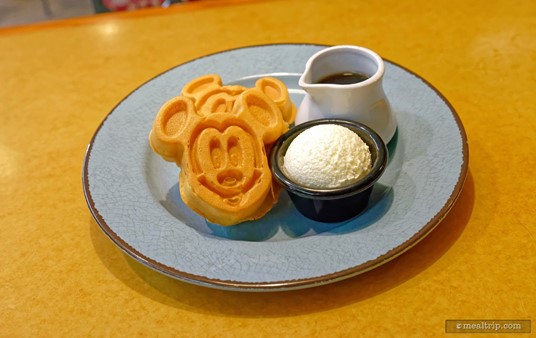 Ahhhh... I never get tired of seeing that happy Mickey Waffle face. Thankfully, the Mickey Waffles with fluffy butter and syrup are the same everywhere — they're a familiar flavor and texture you can count on.