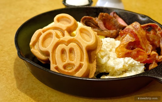 Hey Mickey!!! Here's the Mickey-shaped Waffles that are served in each Garden Grill Breakfast skillet. (There's also some fluffy butter and syrup that are served in separate dishes.) Because Garden Grill is "all you care to eat", you can totally get seconds or third helpings of the Mickey Waffles. I can see them being a popular item at the table.