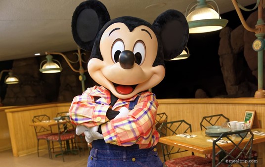 Farmhouse Mickey is one of the characters that walks around at the Garden Grill Restaurant.