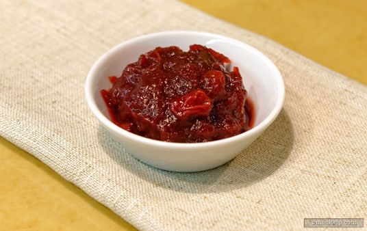 A side dish of Cranberry Sauce for the Sliced Turkey Breast and Stuffing.