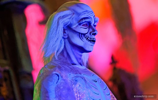 One of the three Grim Grinning Ghosts joins in the Boo To You Parade during Mickey's Not So Scary Halloween Party.