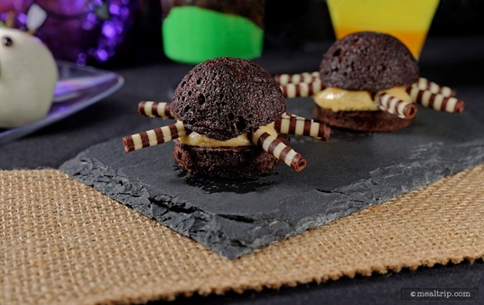 How much time went into making these Chocolate Peanut Butter Spider Whoopie Pies? Those legs are chocolate tubes that are shaved off a block of chocolate by hand, and placed in the sides of the peanut butter cream.