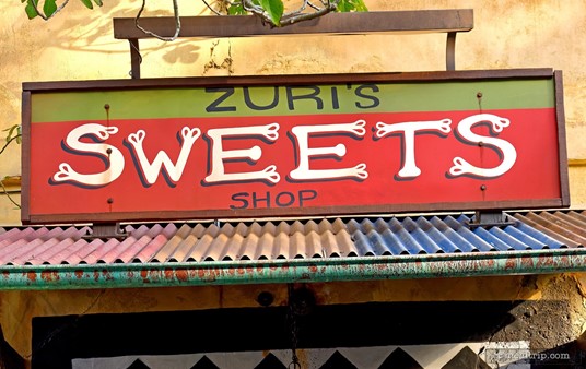 The main sign above the main entrance to Zuri's Sweets Shop.