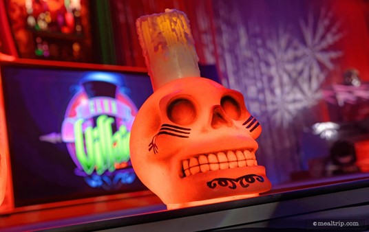 Details are everywhere at Club Villain, like the skull candles that line the stage area.