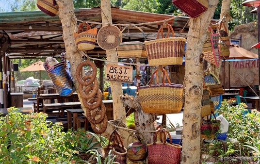 The centerpiece of the market (seating) area is a "basket tree". They are just on the tree for decoration, and not for sale.