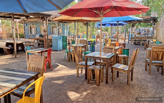 All of the Harambe Market's seating is outdoors. About half of the tables are covered with "sun" umbrellas (these aren't going to provide too much protection from the rain).