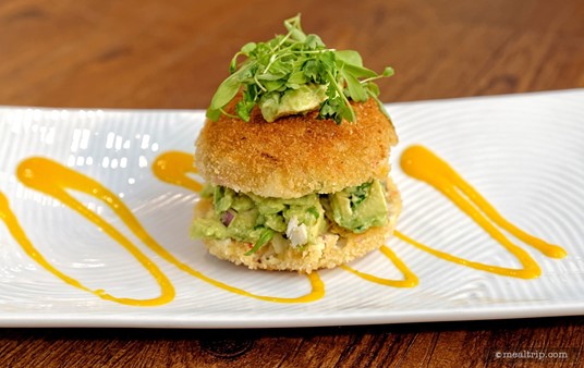 Chef Cat Cora prepared these amazing Crab Cakes with Avocado Salsa and Mango Coulis at her 2015 culinary demo... it may look like a burger, but it's not!