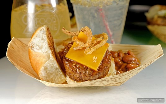 Chef Mikko's Bourbon Burger is a Bourbon BBQ Burger topped with Cheddar Cheese, Fried Onions and Chipotle Aioli on a Parker House Bun. It was served with a side of 24-hour Barrel Braised Beans.