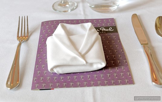 Guests are greeted by these cute folded napkins and each place setting has a menu card that outlines the lunch and provides a bit of background information.