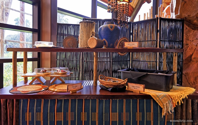 One of the grab-and-go counters at Sanaa's Breakfast period. Only a few items are put out at a time and all are in little plastic containers of one type or another., Sanaa - Breakfast, Disney's Animal Kingdom Villas - Kidani Village