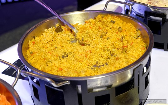 On the "warm items" buffet line, you'll find many "side dishes" with a carving station at the end of the line. Pictured here, yellow rice with a few veggies tossed in the mix.
