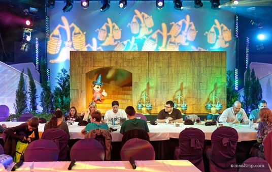 I'm not as familiar with the Fantasia franchise as I should be. This vignette is either a scene from the Sorcerer Mickey segment, or possibly a new adaptation of the last supper.