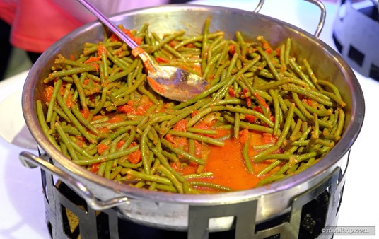Green beans in a garlic tomato sauce at the New Year's Eve dining event at World ShowPlace.