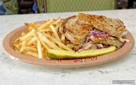 This is Gasparilla Grill's 
                Mahi Mahi "Reuben"                
            
                            
                    
        
            with House-made Cabbage Slaw on Marble Rye served with French Fries and a pickle.