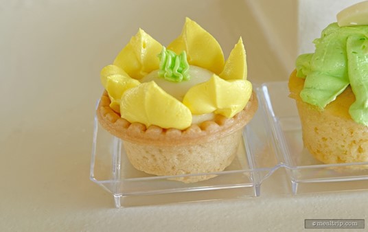 One of three pastry desserts at Tiana's Riverboat Party, a Cream Filled Tart Decorated with Yellow Buttercream Icing.