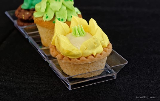 Here's a close-up of a Cream Filled Tart Decorated with Yellow Buttercream Icing. The pastry shell had a little more texture to it than a cupcake, so it was a little different than the cupcake (although the flavors were very similar).