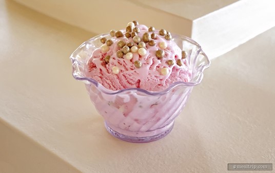 The Strawberry Ice Cream at Tiana's Riverboat Party is really quite good. I topped mine with some sugar pearls. The ice cream is all pre-scooped and kept in giant chillers.