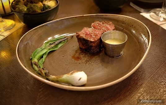 This is the Petite Aged Buffalo Strip Loin at Artist Point. It is sometimes served with a chef selected side or your choice of a side. On the night we went, whole spring onions seemed to accompany every entrée.