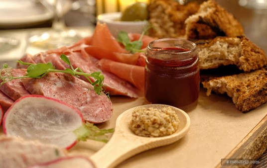 There are so many different flavors and textures on the charcuterie board.