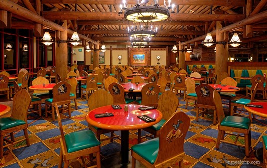 When the main dining area at Whispering Canyon Cafe is empty, it's a little easier to see the spacing. There's a row of tables that are right next to the windows, three rows in the center area, and half-booth tables on the right.