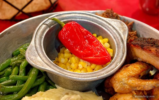 The red pepper on top of the buttered corn is a nice visual touch! I ate the roasted red pepper, as it wasn't a "hot" (capsaicin) pepper, but something more like a sweet banana red pepper.