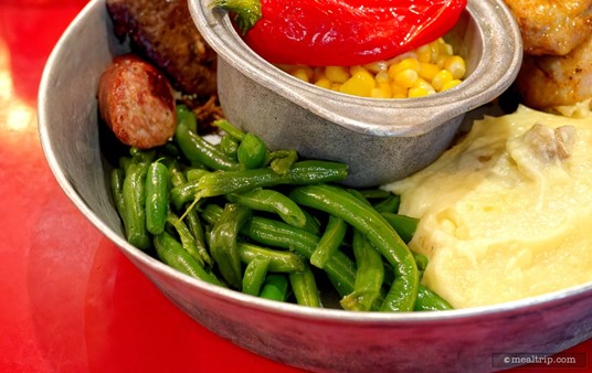 Here's a closer look at the sautéed green beans that are part of "the traditional" skillet at the Whispering Canyon Cafe. Behind those beans, on the right-hand side are a couple of elements that are hiding — a western-style sausage and a small portion of the beef brisket are back there.