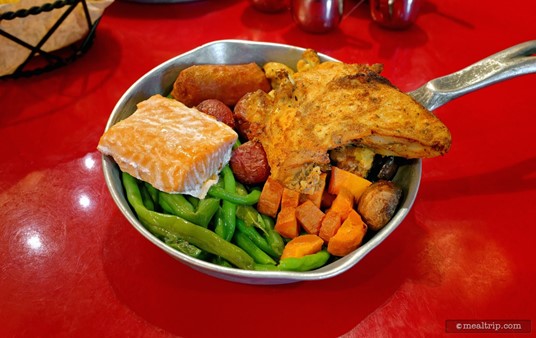 Here's a photo of "The Land and Sea" All You Care to Enjoy Signature Skillet at the Whispering Canyon Cafe.