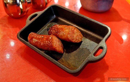 My Land and Sea skillet included a "Spicy Vegan Sausage". To me though, it tasted a little like a pencil eraser. So I asked if I could have a couple of "real" sausages instead — and the waiter said "sure, no problem" — and this is what he delivered to the table... eventually. Two tasty, all meat sausages.