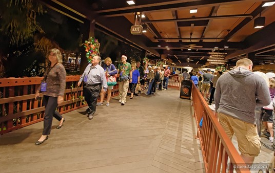 Our Highway in the Sky Dine Around group (on the left) enters the Polynesian Resort from the monorail landing.