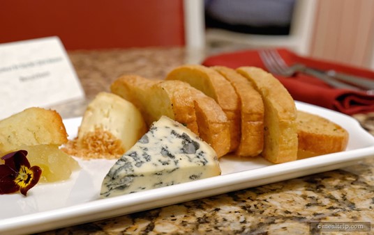 In the front of the plate is the unmistakable Fourme D'ambert Blue Cheese from Ambert, France.