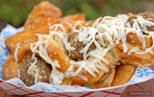 There were three mini meatballs in the Mama's Meatball Pretzel Twist. The item is served with the melted cheese in place. A small cup of Marinara dipping sauce was a welcome add-on item for this pretzel.