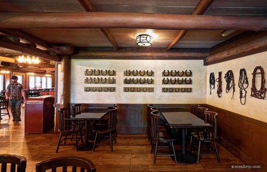 Here's a closer look at the horseshoe display inside the Trail's End dining area. It might seem like more private area back here, but actually – the kitchen entrance and a side entrance are located just out of frame to my right and behind me.