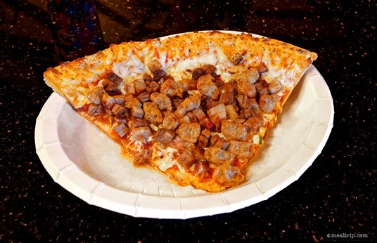 The Smokehouse Pizza is described as having "house-smoked brisket, sausage, and pepperoni".