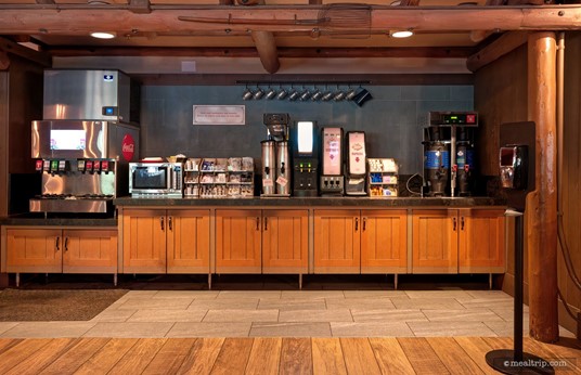 Upon closer inspection, all the standard beverage station items are here – a soda and ice machine, some hot water, a couple of coffee and tea dispensers, condiments (including everything from coffee creamer to ketchup and even salad dressings, dipping sauces, and little jelly packets), a microwave, and some napkins and plastic utensils.