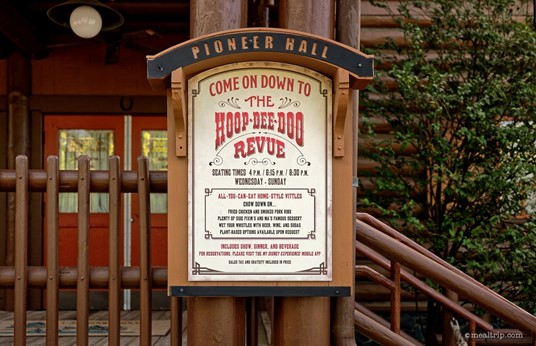 Here's a look at the Hoop Dee Doo Revue sign that's posted outside Pioneer Hall. The photo was taken in 2025, but the sign doesn't change much. The times might though... it's always best to check with the Disney official reservations page for current show times.