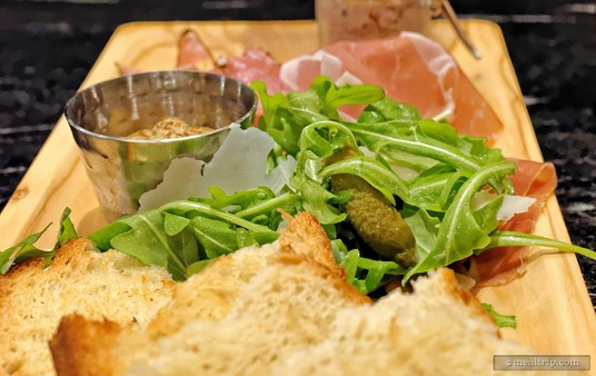 In the middle of the Charcuterie board is an amazing shaved Parmesan and Arugula mix, along with a couple of Cornichons pickles.