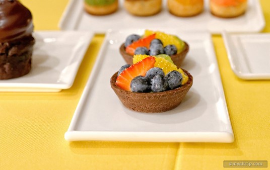 The fruit in the Fruit Tarts was sitting on top of a bit of vanilla cream in that fresh pastry cup. The fresh cut fruit was specifically placed, and all looked great. There was a strawberry, orange and kiwi slice along with several blueberries in each cup.