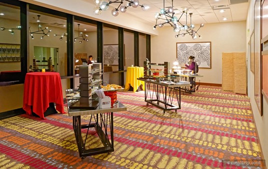 The "food station" room is just across the hall, and is only half as large. The whole idea here is, you pick-up food here, and bring it back to your table in the other room.