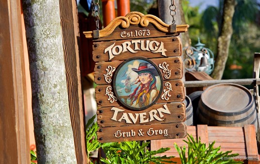The Tortuga Tavern Grub & Grog street-level sign.