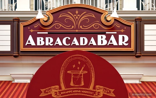 The main sign above the AbracadaBar. (Yes, that's a room balcony directly above the sign!)