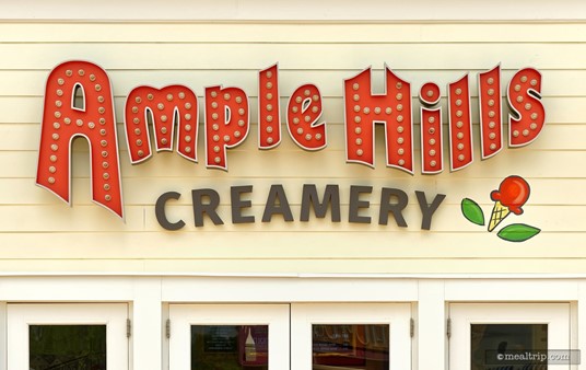 The main sign for the Ample Hills Creamery is located directly under the front door(s).