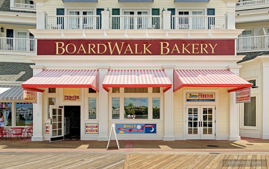 The front of the BoardWalk Bakery building. There is some outdoor seating to the left.