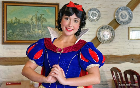 Snow White makes her rounds to visit with each table and chat during the Akershus character breakfast.