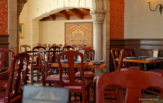 Look at all those chairs! This photo was taken in the main dining area (in the center of Akershus), looking north west at a tapestry hanging on a wall in the "hearth room" dining area.