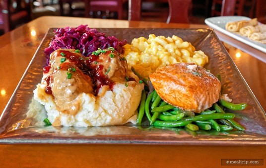 Here's two of the three proteins that make up the main course platter... on the left are the Kjøttkake or Norwegian Meatball with Gravy and Lingonberry Sauce and on the right is the Herbed Butter Grilled Salmon on top of green beans. The third protein (not pictured) is the Kylling go Melboller, or Norwegian Chicken and Dumplings.