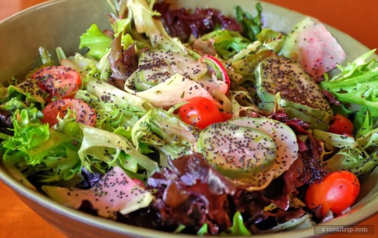 Look at all those poppy seeds! This is a really great, rustic, mixed greens salad that's pretty close to what you would find in Norway actual.