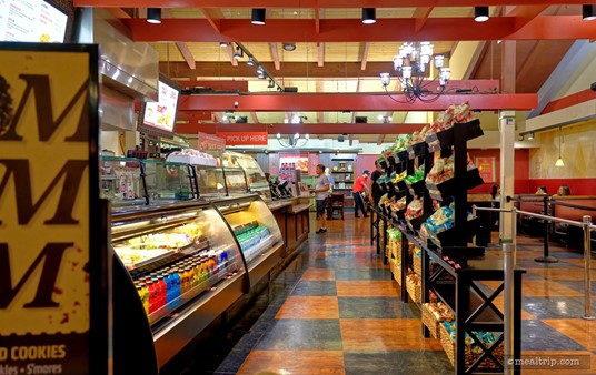 The line at Earl of Sandwich is almost never this empty though. If you look to the far right, you'll see silver, metal stanchions (line poles) — the line of people is usually at least two rows deep. (This photo was taken just after closing.)