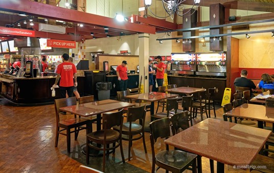 Here's a slightly better view of the beverage station. The napkins and straws, forks, etc., are located behind that column in the center of the photo.